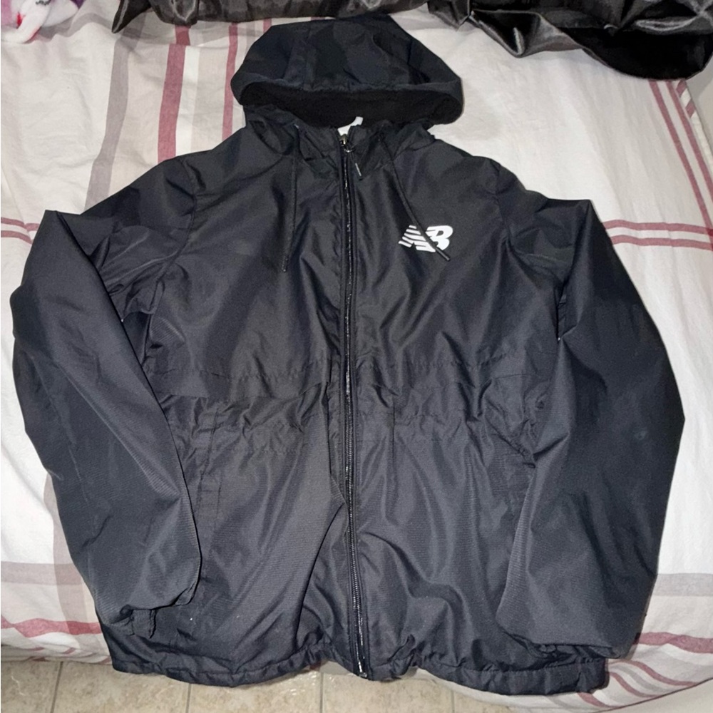 New Balance women’s Dark Windbreaker